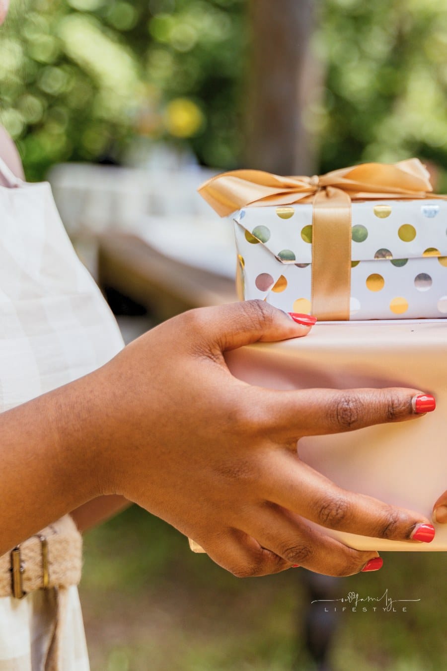 Hands Giving and Receiving Wrapped Presents